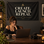 Create. Launch. Repeat Banner in a styled lifestyle setting, with two grommets on one short edge; illustrative mockup.