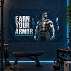 Earn Your Armor Banner in a styled gym; illustrative mockup with two grommets along the left short edge. Display clips and props not included.