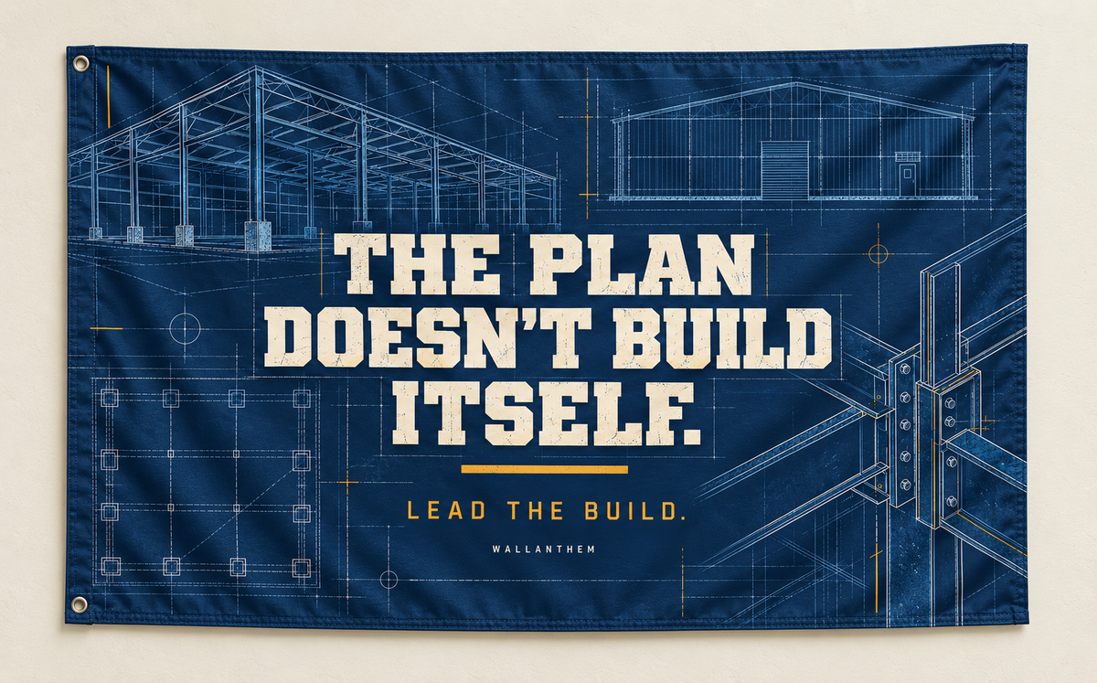 The Plan Doesn’t Build Itself fabric banner mockup; two grommets along the left short edge